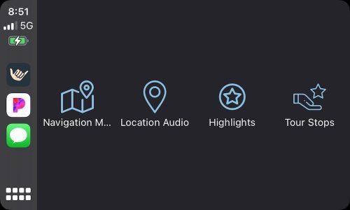 Screenshot of the Shaka Guide app while using Apple CarPlay. The Shaka Guide icon is on the left side where other navigation icons would be. On the right side are the options that Shaka Guide gives users: navigation, location audio, highlights, and tour stops.